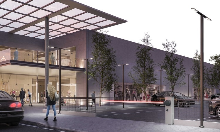 KingGates Nuur RGB LED fényoszlop parkoló bejáratához telepítve, amely piros és zöld fénnyel jelzi az áthaladási jogosultságot a TEMA rendszerében.